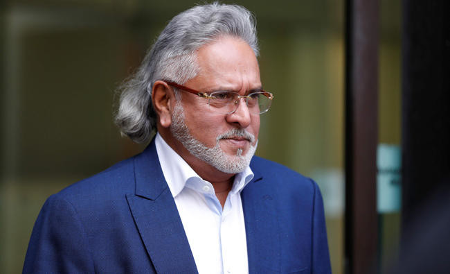 Indian tycoon Vijay Mallya faces new charges; free on bail