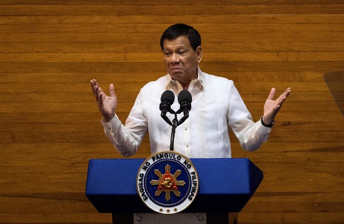 Philippine environment minister says to uphold President Duterte’s open-pit mining ban