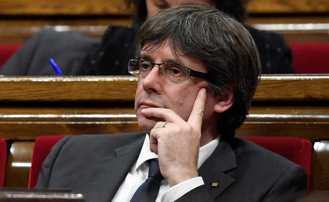 Catalonia’s axed leader ‘in Brussels’