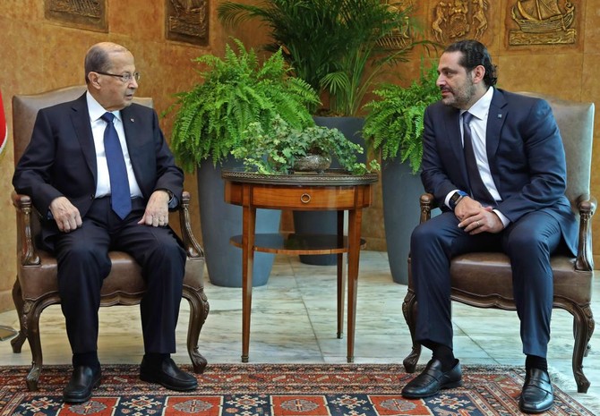 Hariri puts resignation on hold, to stay in Lebanon