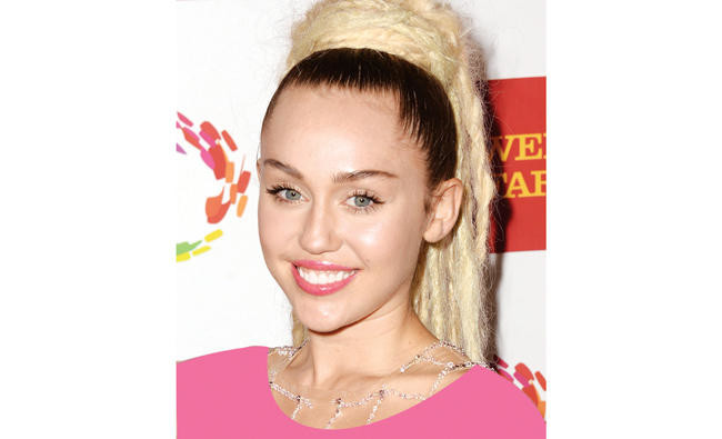 Pop star Miley Cyrus dismisses pregnancy rumors