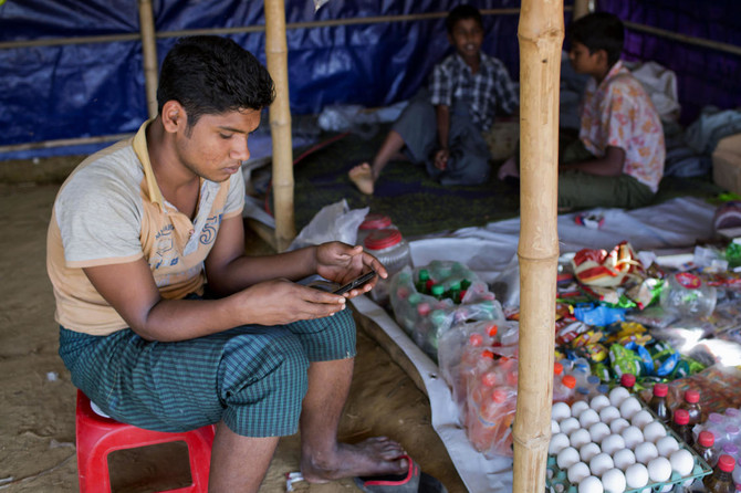 Heartbroken Rohingya refugees return home to Myanmar, even if only in videos