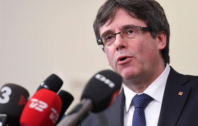 Sacked Catalan leader asks to return to Spain ‘risk-free’