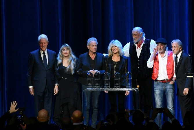 Bill Clinton repays a favor to Fleetwood Mac at MusiCares ceremony