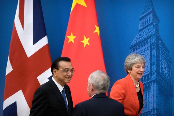 On China visit, Britain’s Theresa May focused on post-Brexit future