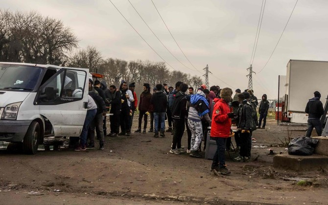 Four migrants wounded in shooting in northern France