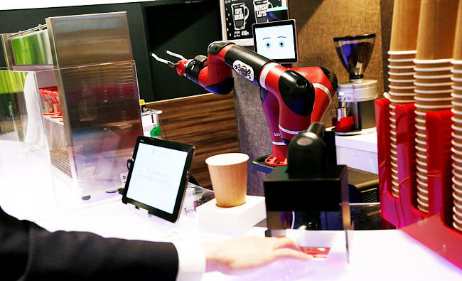 Robot makes coffee at new cafe in Japan’s capital