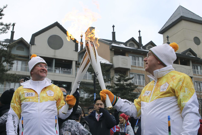 In cold, poor South Korean mountains, Winter Olympics begin