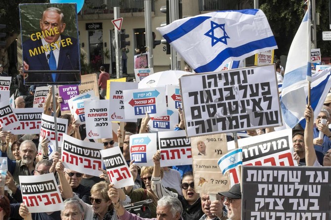 Israeli protesters urge Netanyahu to step down over bribery allegations