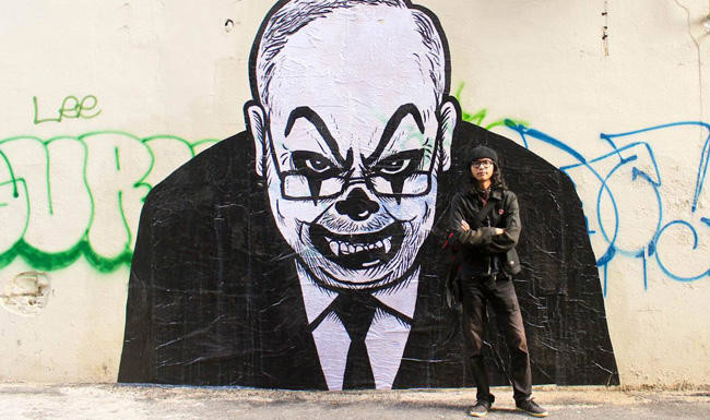 Malaysian court jails, fines artist for clown caricature of Najib Razak