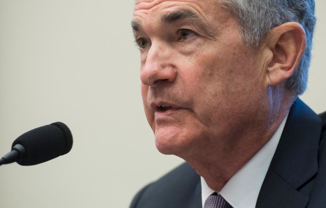 Wall Street slips after Jerome Powell sees strengthening economy, rising inflation