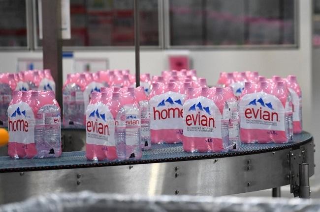 Evian, San Pellegrino and other top bottled water brands contaminated with plastic particles, study says