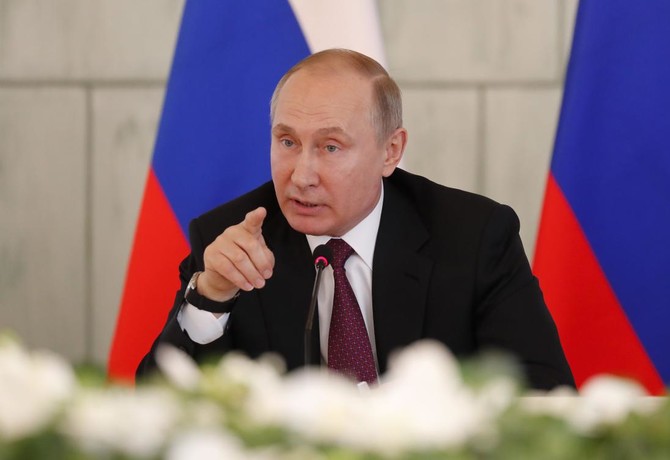 Putin appeals to ‘love of fatherland’ to get Russians to polls