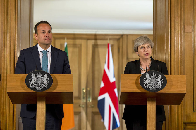 UK wins Brexit transition deal in return for Irish vow