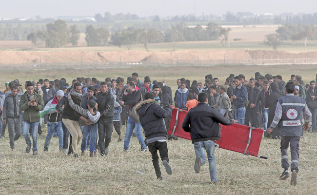 Abbas calls on UN to protect Palestinians after Israeli troops kill 16 protesters